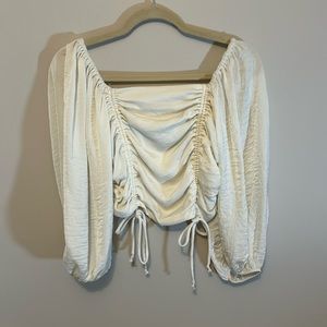 Boutique white long sleeved crop